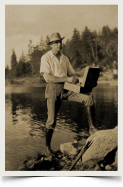 Tilden Daken painting on the rim of the World, Lake Arrowhead, 1923.